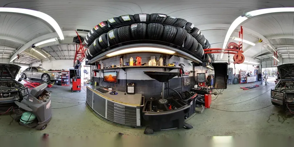 Tire rack and work stations inside Thompson Lane Auto
